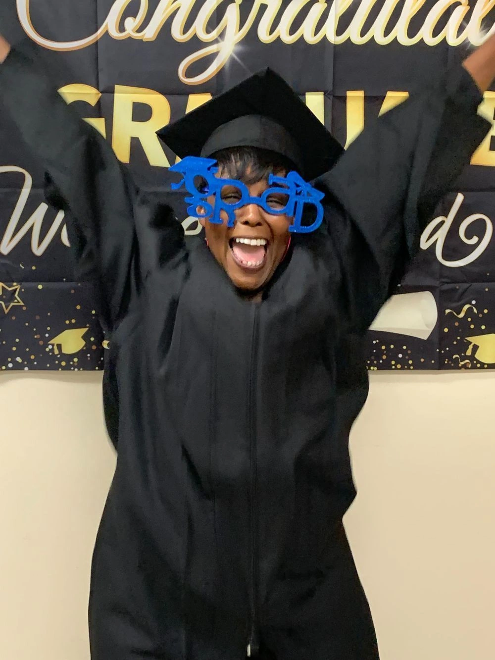 graduate showing excitement about completing the program graduate showing excitement about completing the program
